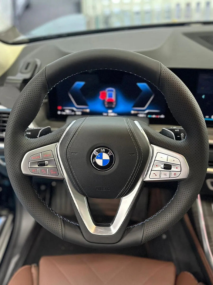 BMW custom steering wheel cover in black Nappa leather with perforated grips and blue stitching