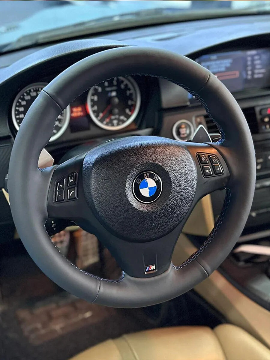 BMW custom steering wheel cover in black Nappa leather with smooth rim sections and perforated grips