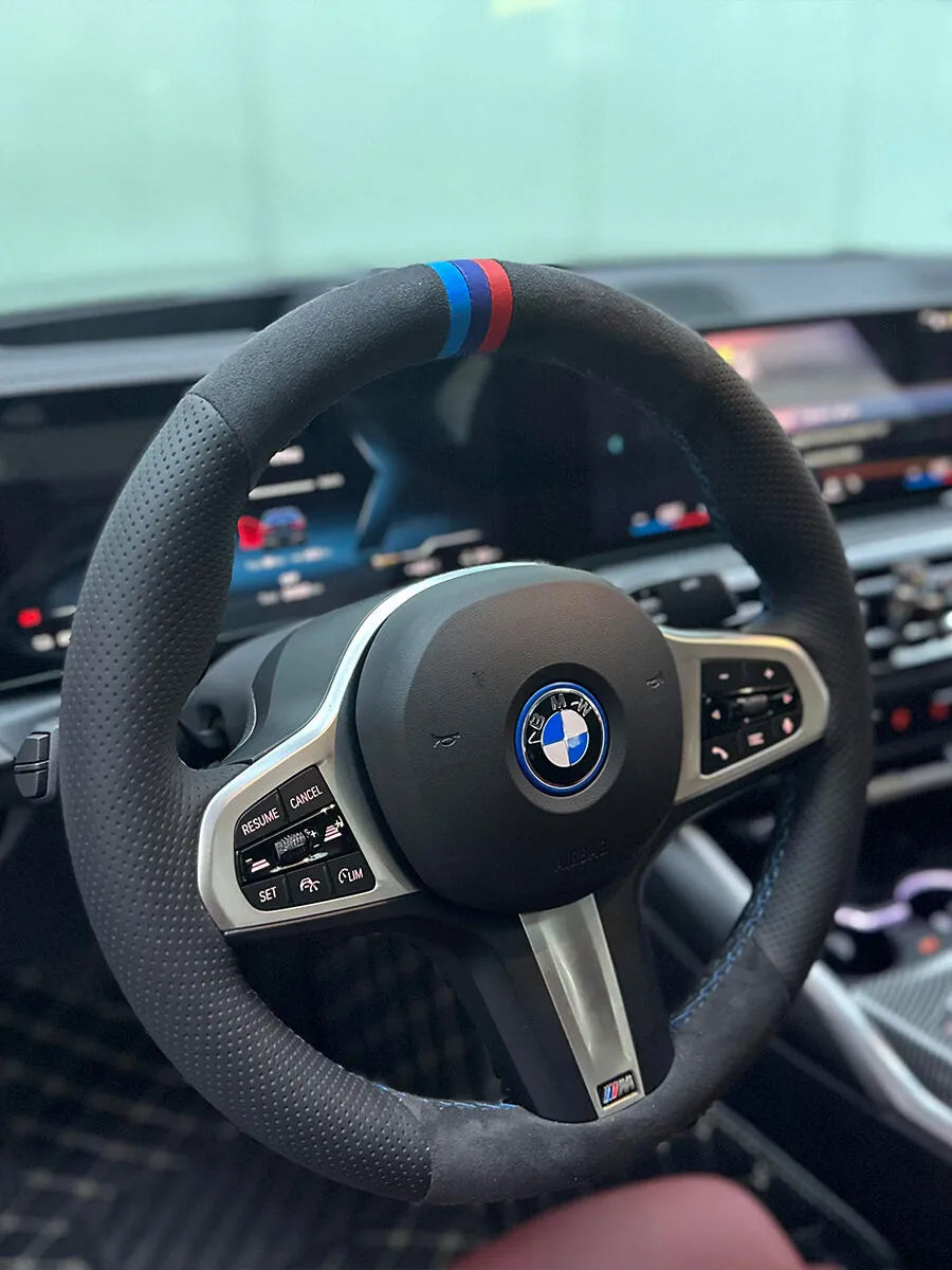 BMW custom steering wheel cover with dark Alcantara, perforated leather and a blue-red center marker