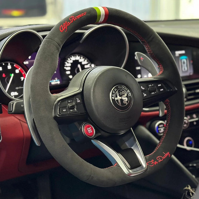 Custom side embroidery on an Italian Alcantara steering wheel cover