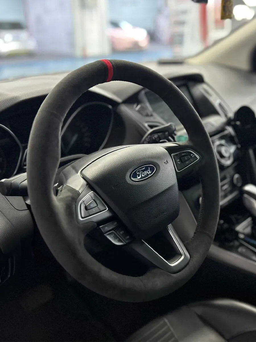 Ford custom steering wheel cover in black Italian Alcantara with perforated grips and a red center marker