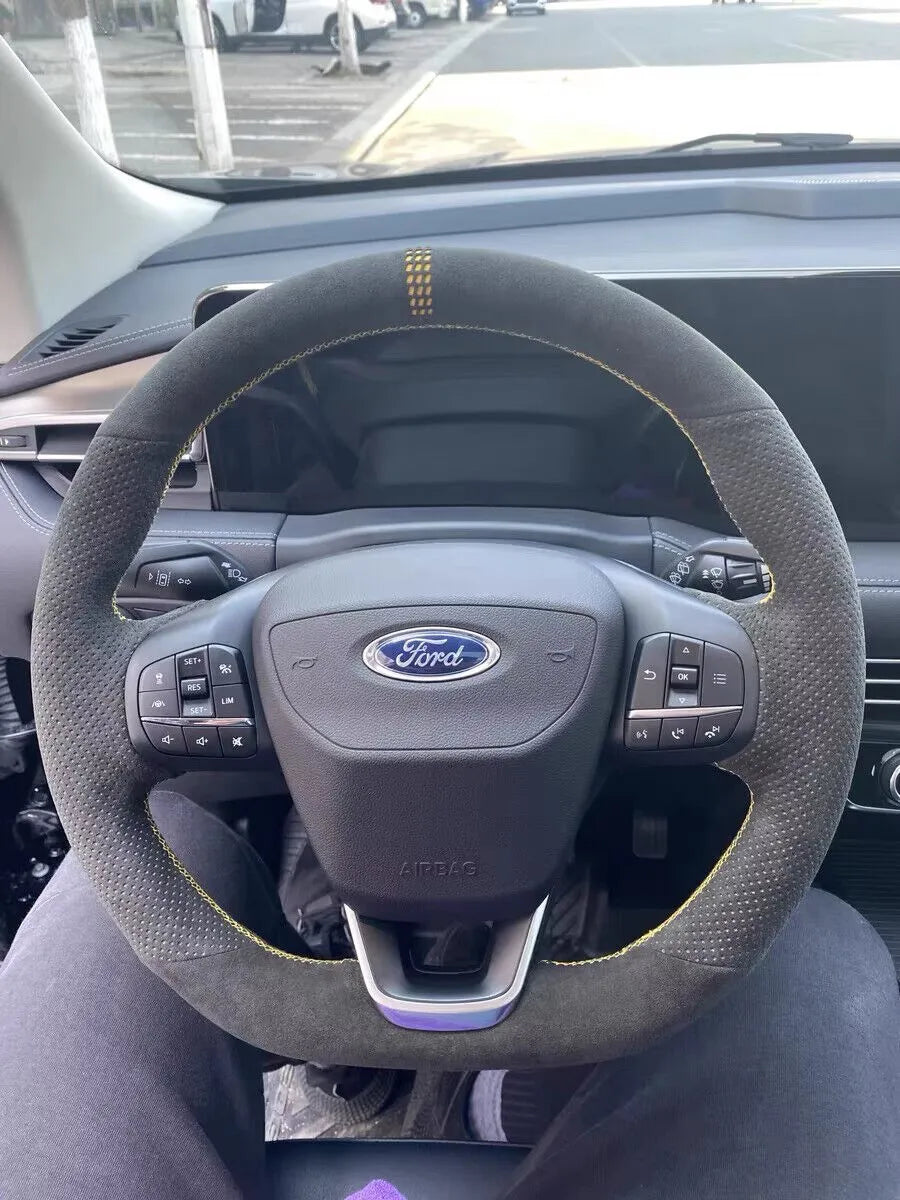 Ford custom steering wheel cover in gray Italian Alcantara with perforated grips and yellow stitching
