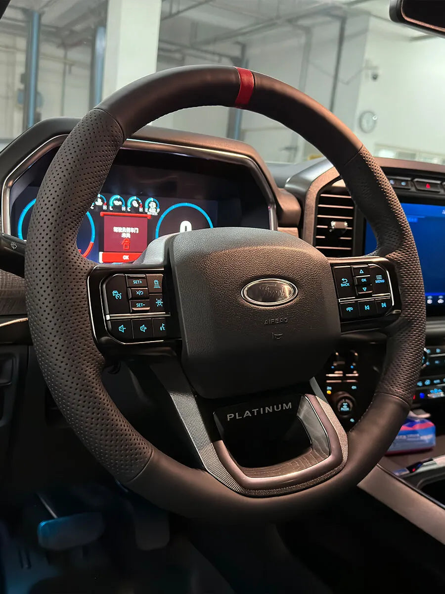 Ford custom steering wheel cover in black Nappa leather with perforated grips and red stitching