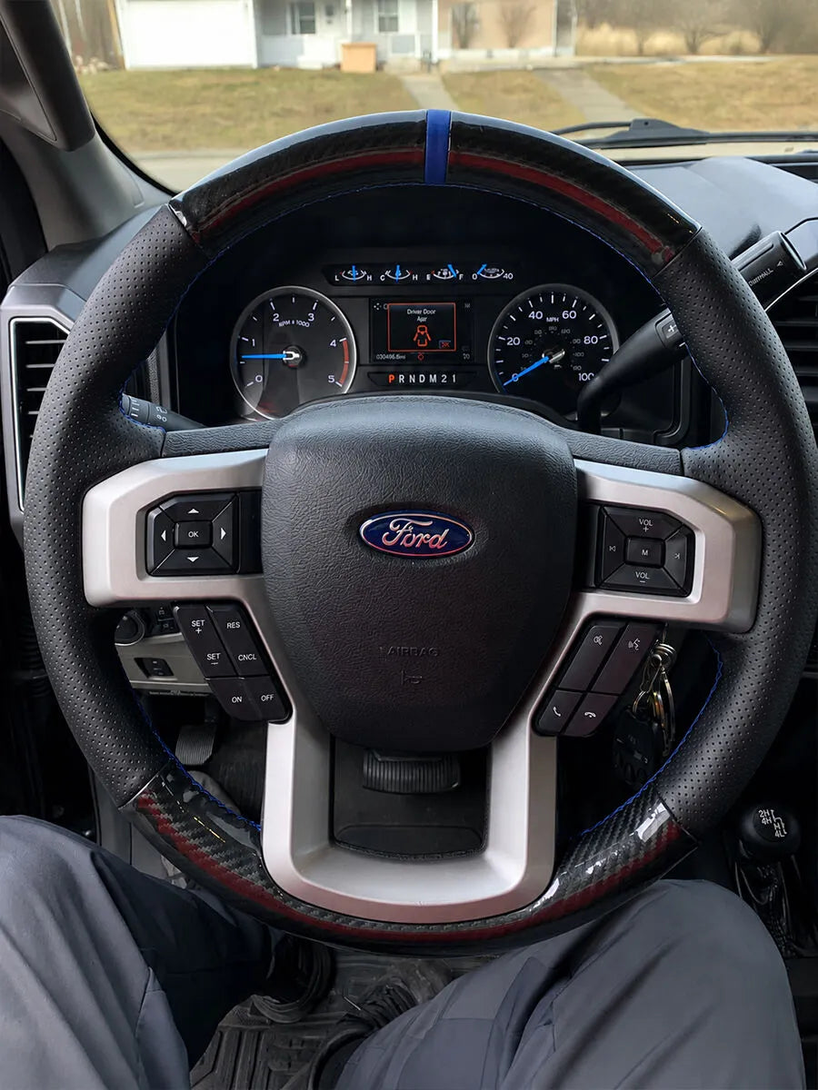 Ford custom steering wheel cover with carbon-fiber-style sections, perforated grips and blue details