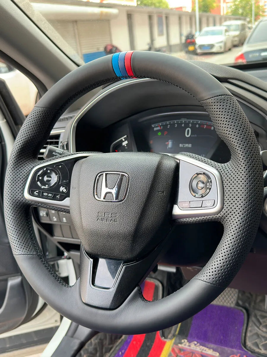 Custom Honda steering wheel cover with black Nappa leather, perforated side grips, and a tri-color center stripe