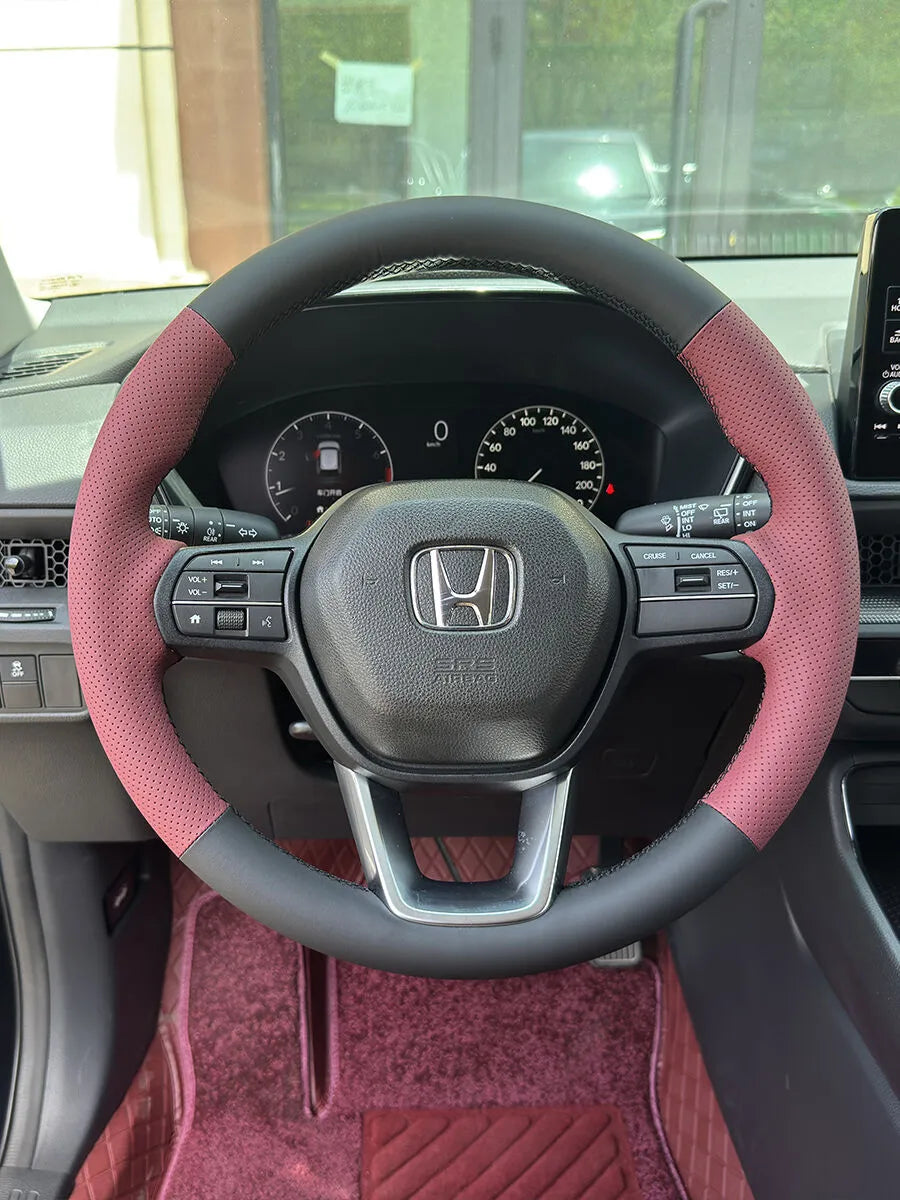 Custom Honda steering wheel cover with black faux leather and burgundy perforated leather side grips
