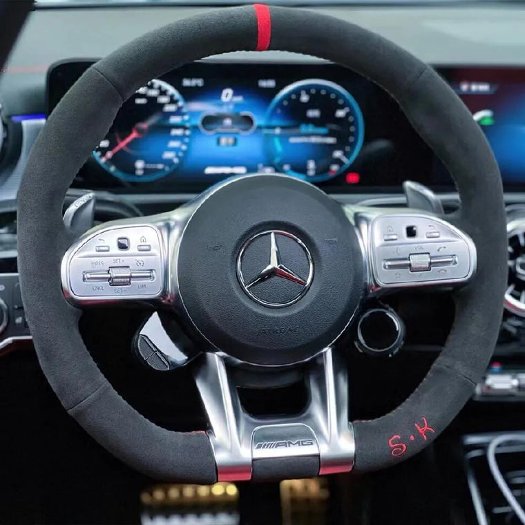 Mercedes-Benz steering wheel with dark Alcantara, red initials embroidery and a red center marker
