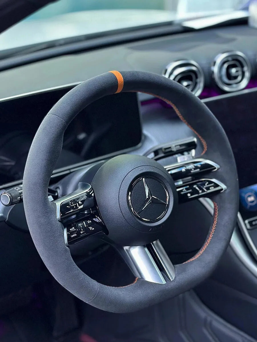 Mercedes-Benz custom steering wheel cover in dark gray Italian Alcantara with an orange center marker