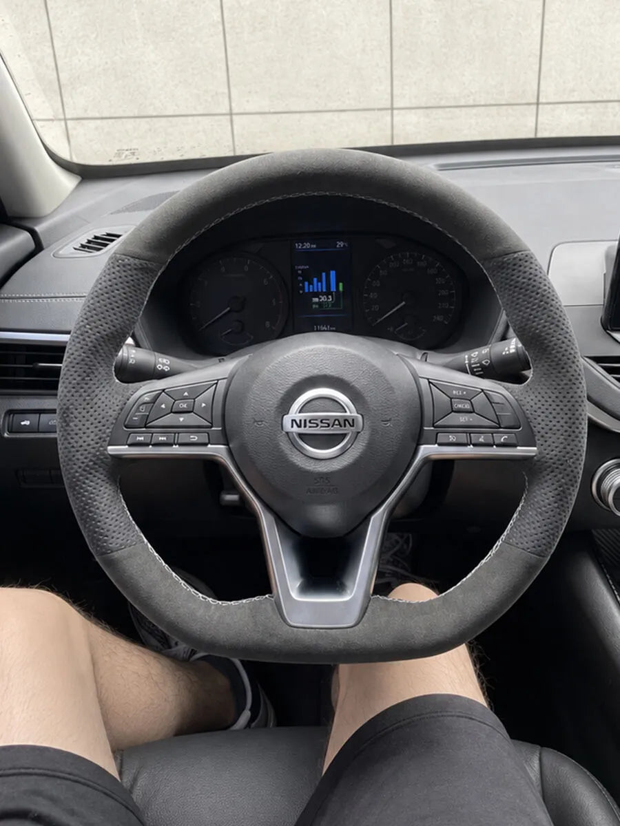 Nissan custom steering wheel cover in dark gray Italian Alcantara with perforated side grip sections