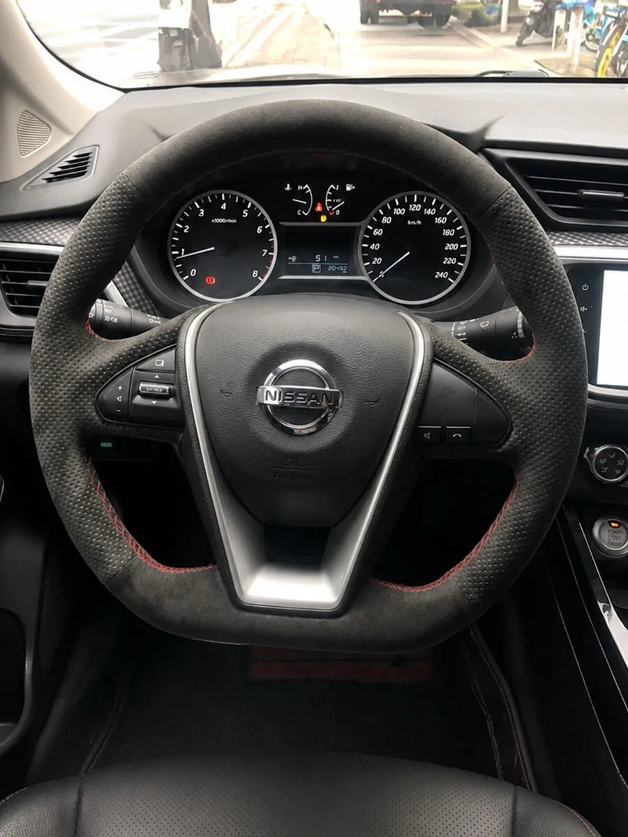 Nissan custom steering wheel cover in black Italian Alcantara with perforated grips and red stitching