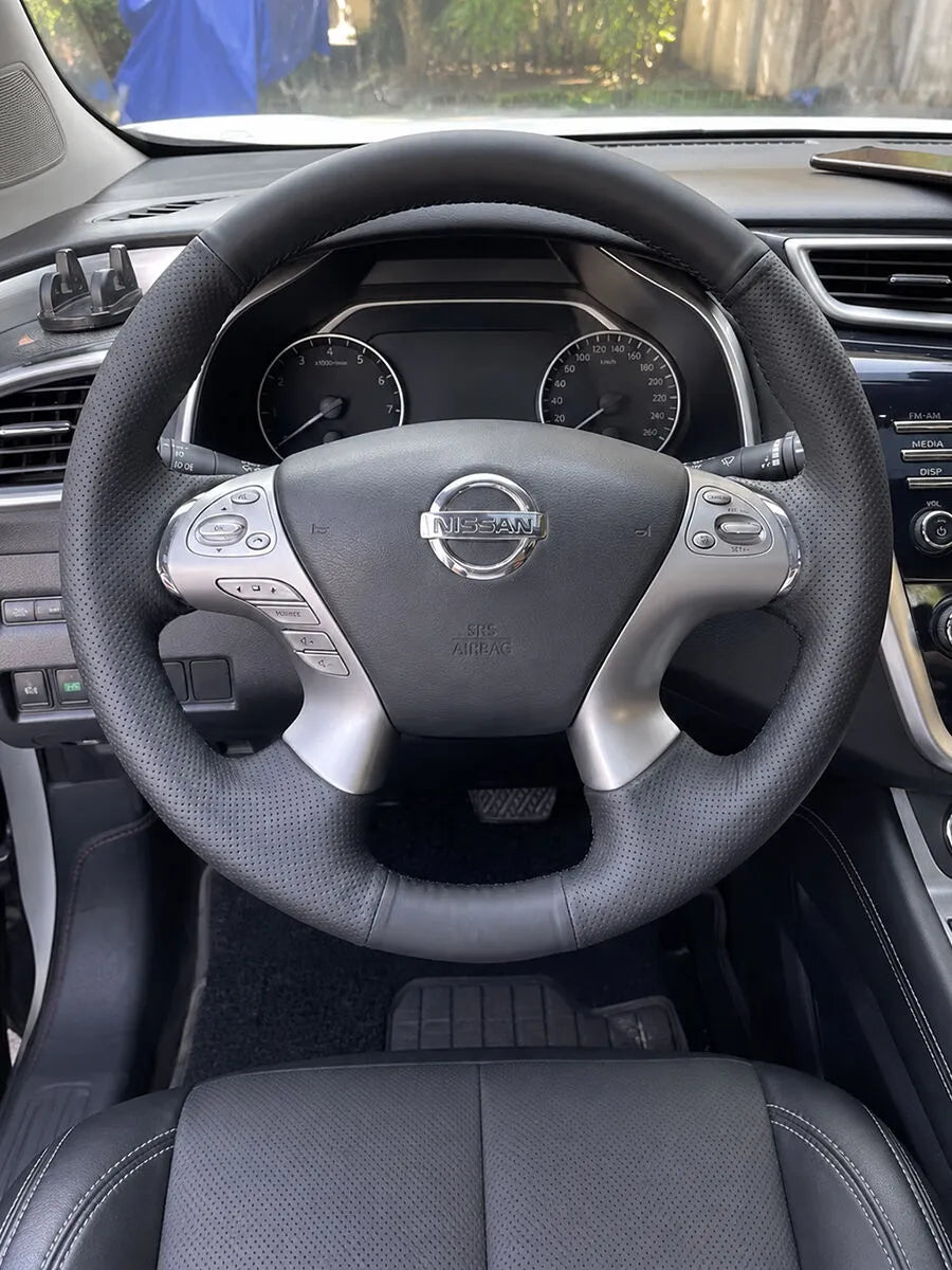Nissan custom steering wheel cover in black Nappa leather with perforated side grips and black stitching