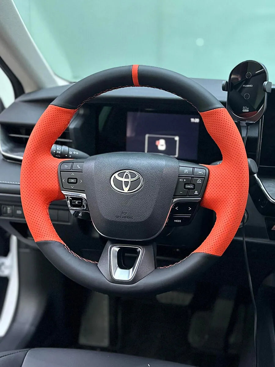 Toyota Camry steering wheel with black and orange faux leather custom cover
